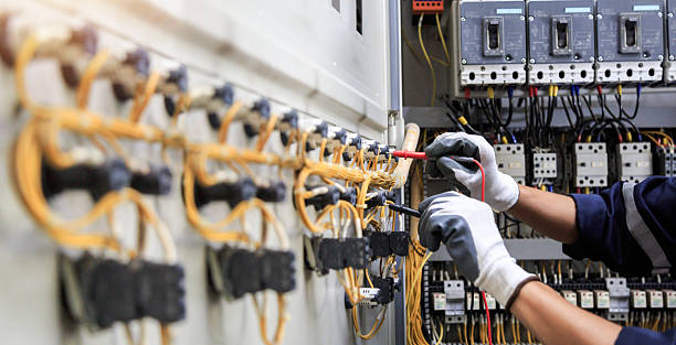 Professional Electrician technician working in Village of the Branch, NY